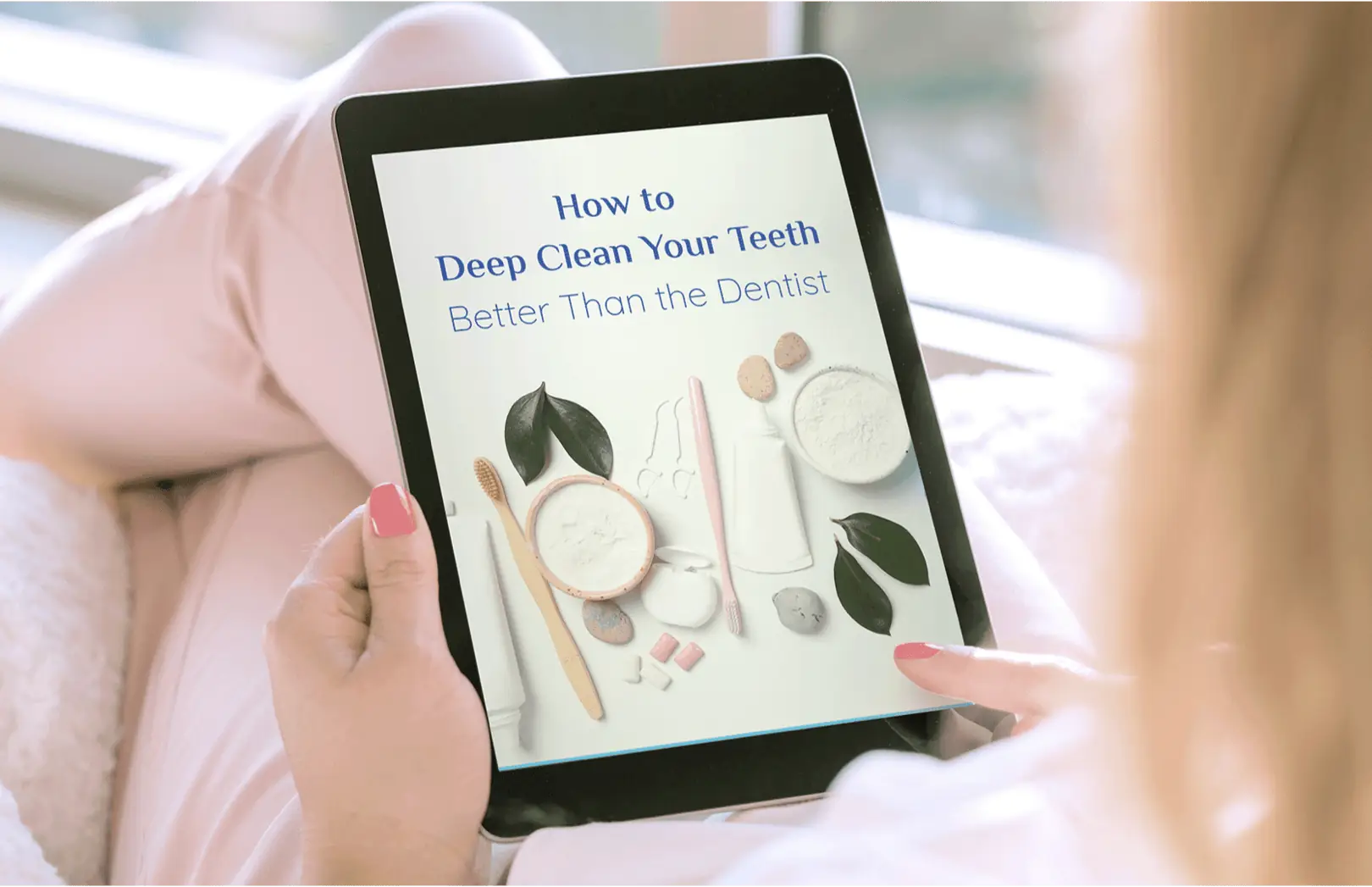 Bonus guide: How To Deep Clean Your Teeth Better Than The Dentist, shown on a tablet